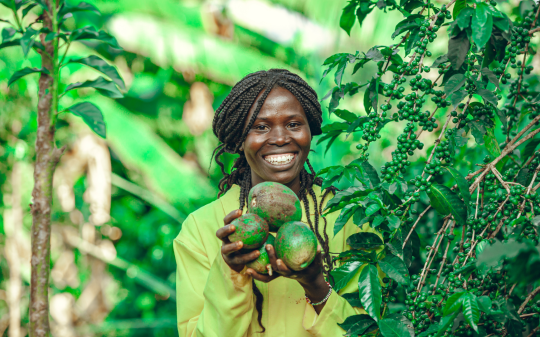 Woman holding a fruit